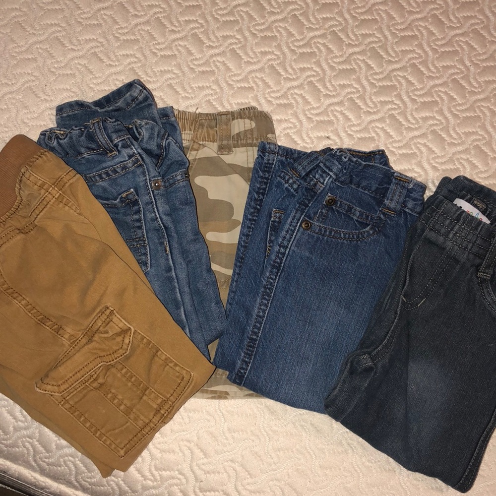 Lot of Boys pants sizes 2T and one wrangler 3T.